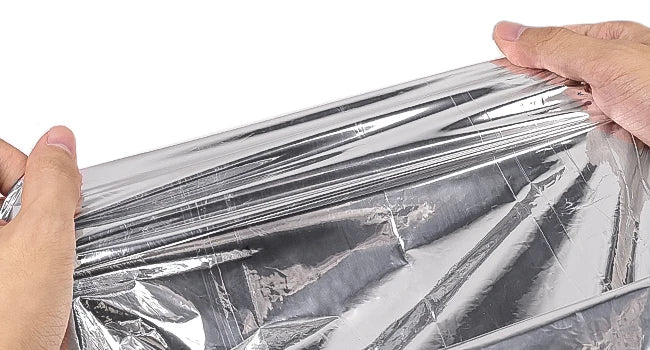 Saco de Dormir Térmico de Emergência com Apito – detalhe da face interna prateada