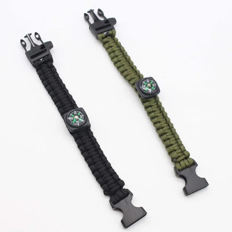 Pulseira de Sobrevivência Paracord com Bússola e Apito – pulseiras preta e verde abertas, com fecho de apito